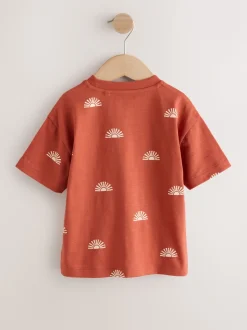 Soleil rouge rouille - T-shirt imprimé sur l’ensemble à manches courtes (3 mois7 ans) (3mois7ans)