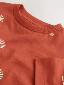 Soleil rouge rouille - T-shirt imprimé sur l’ensemble à manches courtes (3 mois7 ans) (3mois7ans)