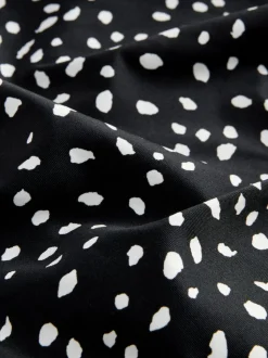 Tache noire/blanche - Maillot de bain gainant le ventre froncé