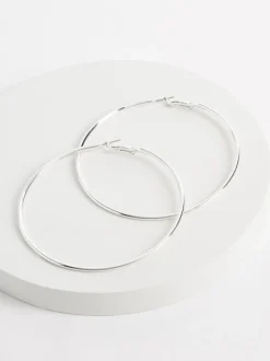 Tonalité argentée - Boucles d’oreilles créoles surdimensionnées