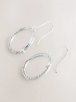 Tonalité argentée - Boucles d’oreilles cercle ouvert avec détail scintillant