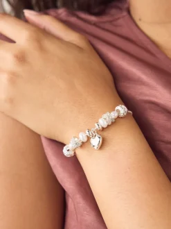 Tonalité argentée - Bracelet pully à perles perles effet maïs soufflé effet perle