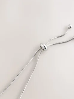 Tonalité argentée - Bracelet pully à perles perles effet maïs soufflé effet perle