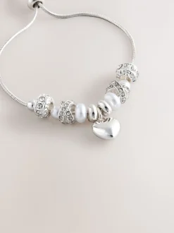 Tonalité argentée - Bracelet pully à perles perles effet maïs soufflé effet perle