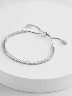 Tonalité argentée - Bracelet extensible à pierres baguettes