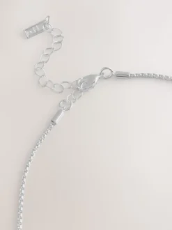 Tonalité argentée - Collier long avec pendentif
