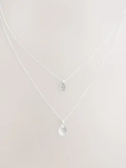 Tonalité argentée - Collier multi-couches à pétales scintillants