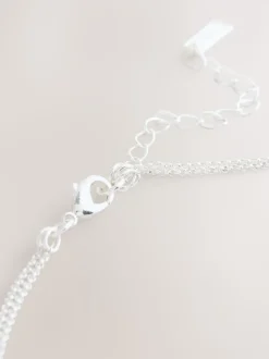 Tonalité argentée - Collier multi-couches à pétales scintillants