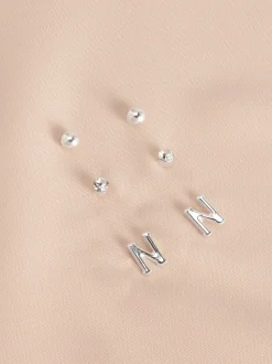 Tonalité argentée - Lot de boucles d’oreilles initiales