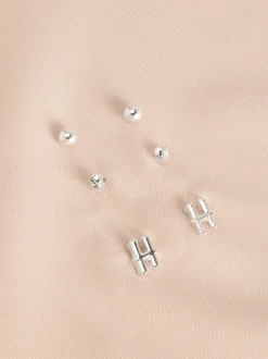 Tonalité argentée - Lot de boucles d’oreilles initiales