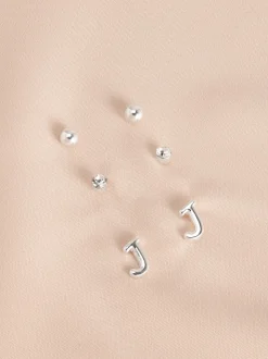 Tonalité argentée - Lot de boucles d’oreilles initiales