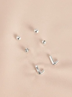 Tonalité argentée - Lot de boucles d’oreilles initiales