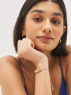 Tonalité d'or - Bracelet pully scintillant avec maïs soufflé perlé