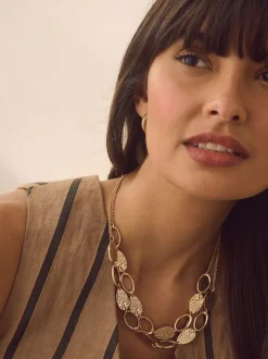 Tonalité d'or - Collier double épaisseur à découpe