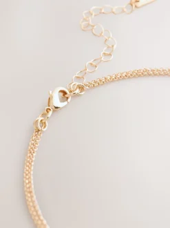 Tonalité d'or - Collier multi-couches à pétales scintillants